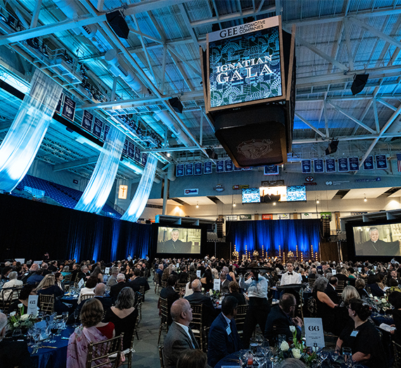 President Katia Passerini stands in front of windows in Hemmingson Center